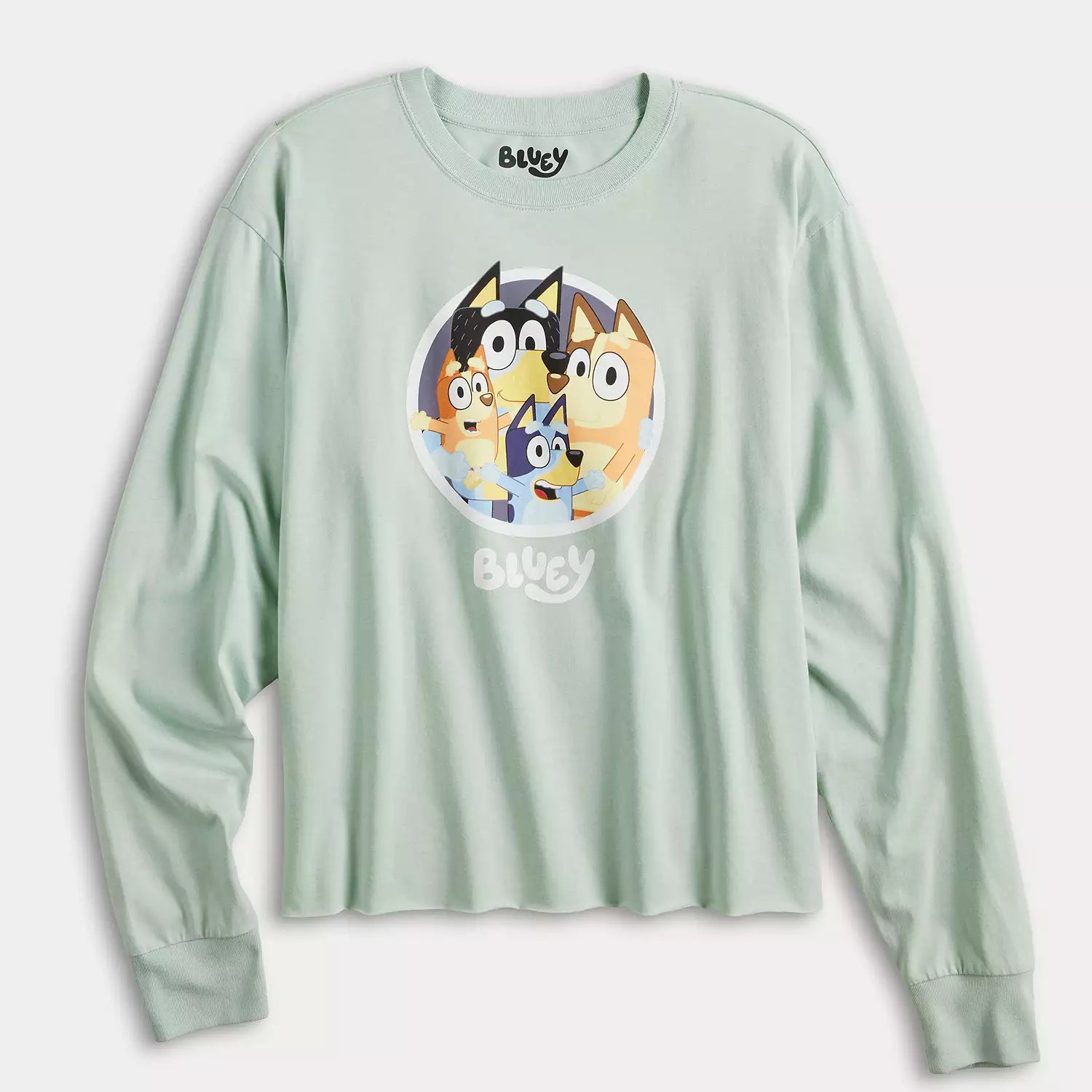 Light green long-sleeve shirt with cartoon character design on a white background