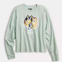 Light green long-sleeve shirt with cartoon character design on a white background
