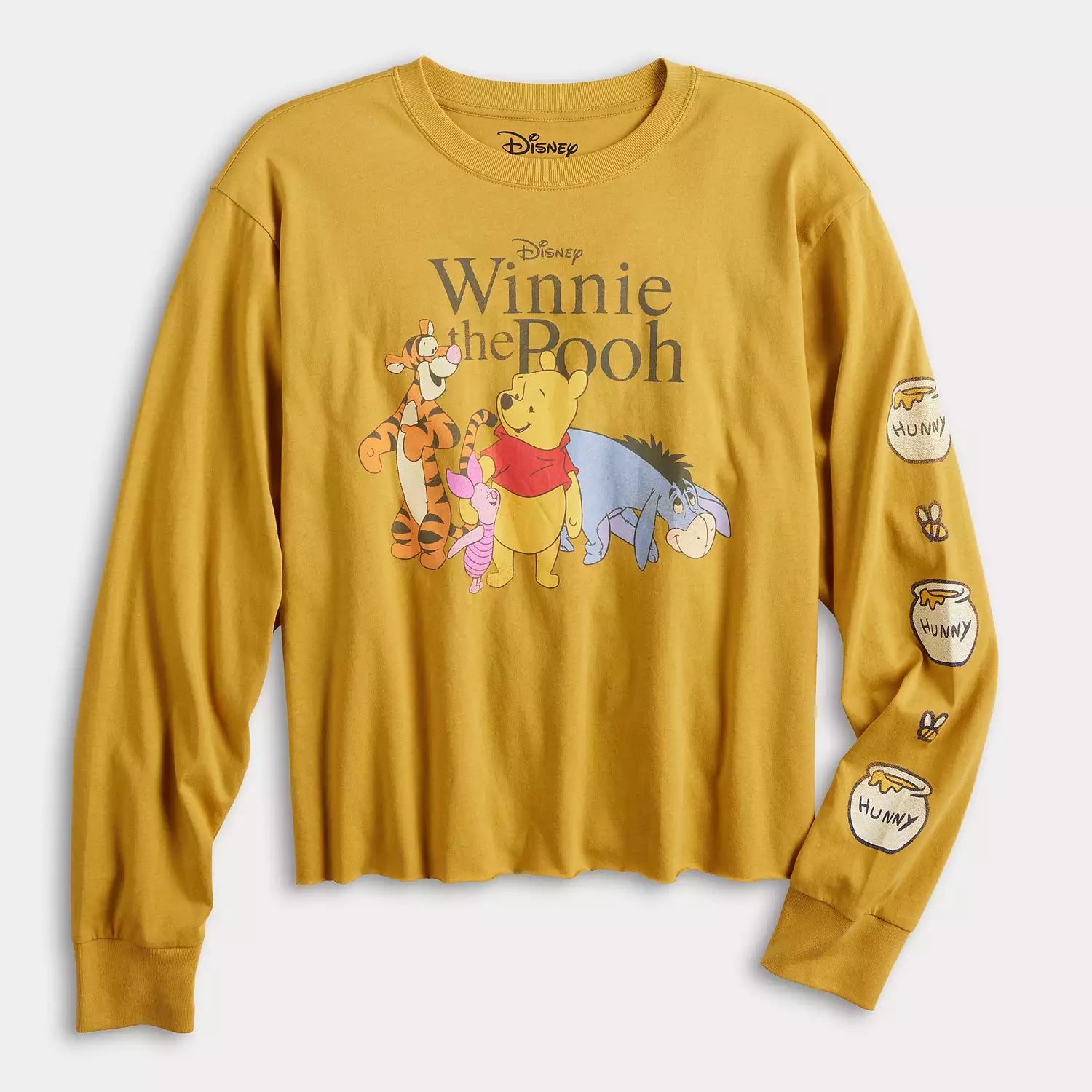 Yellow long-sleeve shirt with Winnie the Pooh and friends design on a white background