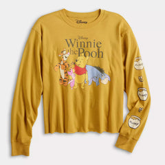 Yellow long-sleeve shirt with Winnie the Pooh and friends design on a white background