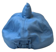 Blue fabric pumpkin with a stem on a beige background